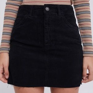 Subdued cutoff corduroy mini skirt